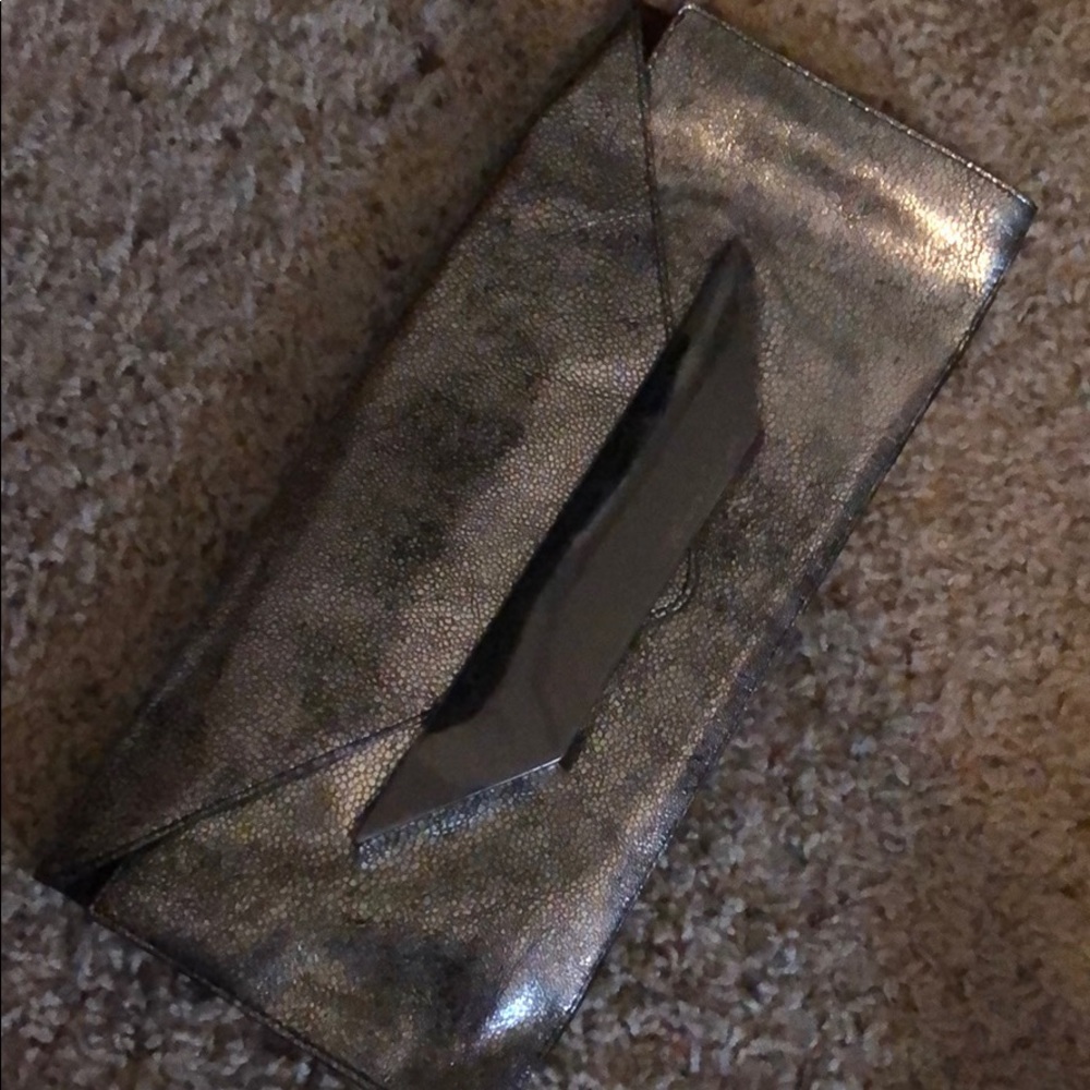 Kenneth Cole New York metallic silver clutch
